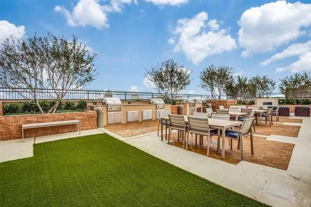 view of yard featuring area for grilling and a patio