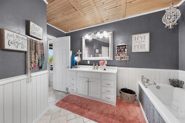 full bath with wood ceiling, wainscoting, a jetted tub, and vanity