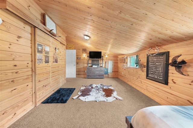 carpeted bedroom featuring wooden ceiling, wood walls, and lofted ceiling