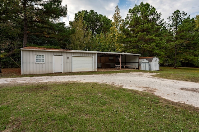 garage with a yard