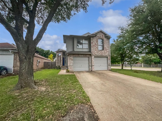 5103 Whitehaven Dr, Garland, TX 75043 - traditional-style home with an attached garage, concrete driveway, and brick siding