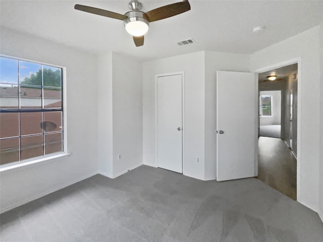 5103 Whitehaven Dr, Garland, TX 75043 - unfurnished bedroom with carpet, ceiling fan, and baseboards