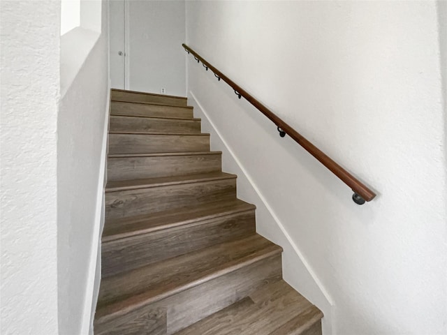5103 Whitehaven Dr, Garland, TX 75043 - staircase with wood finished floors