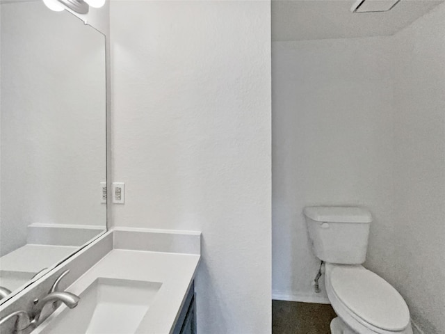5103 Whitehaven Dr, Garland, TX 75043 - bathroom with vanity and toilet
