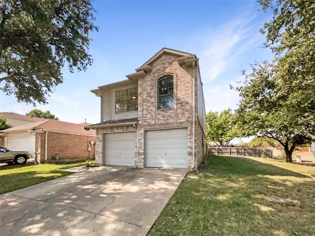 front of property with a front yard and a garage