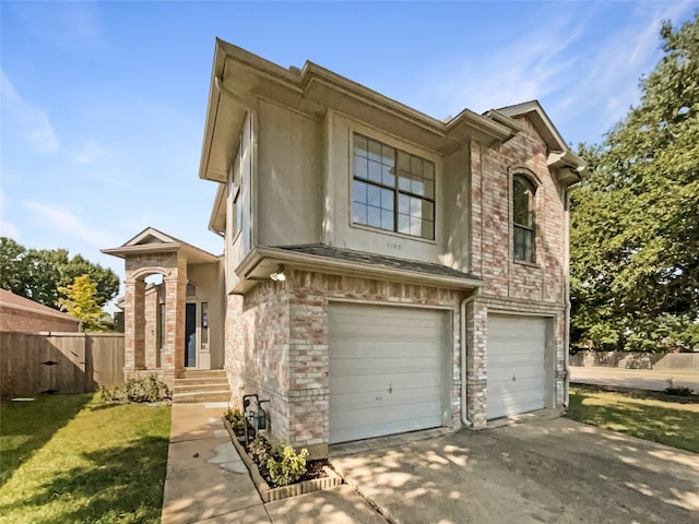 view of front facade with a front lawn and a garage