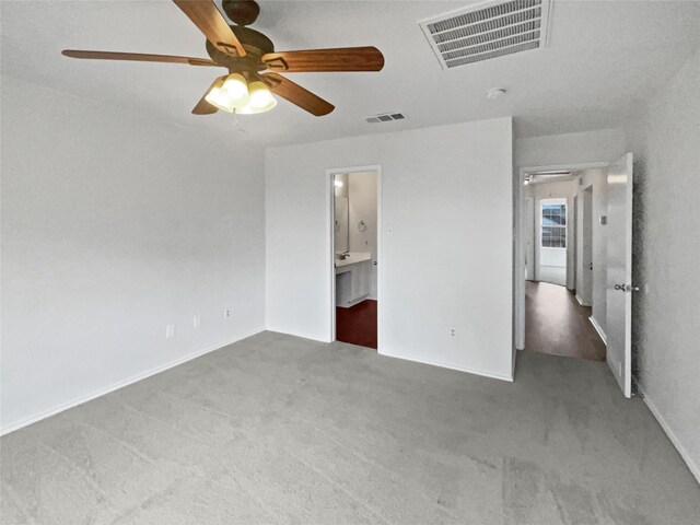 5103 Whitehaven Dr, Garland, TX 75043 - unfurnished bedroom featuring carpet floors, ceiling fan, baseboards, and ensuite bath