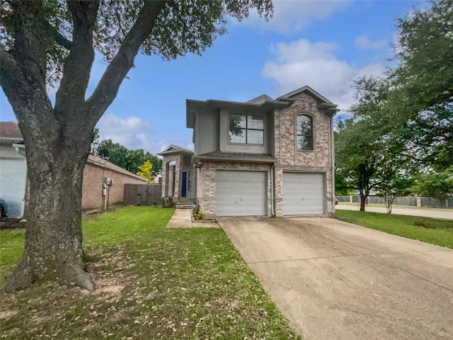 5103 Whitehaven Dr, Garland, TX 75043 - traditional-style home featuring a garage, concrete driveway, and brick siding