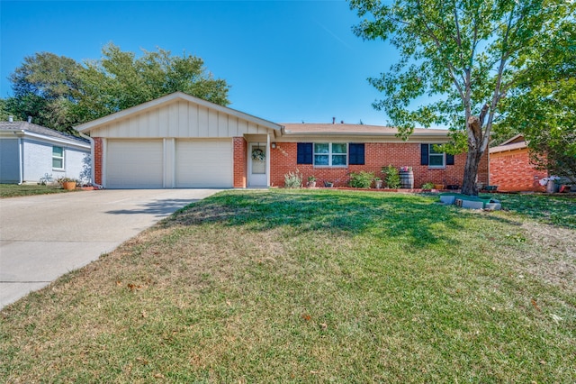 single story home featuring a front lawn and a garage