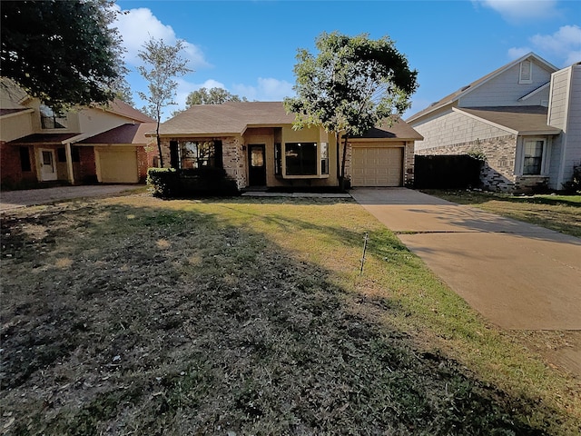 ranch-style house with a front yard and a garage