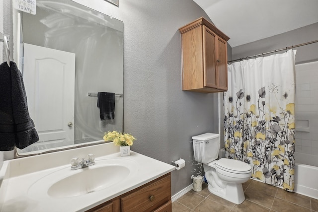 full bathroom with vanity, shower / bath combination with curtain, toilet, and tile patterned flooring