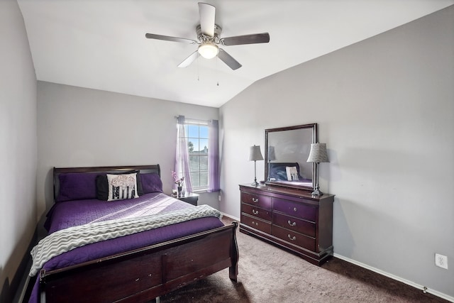 carpeted bedroom featuring vaulted ceiling and ceiling fan