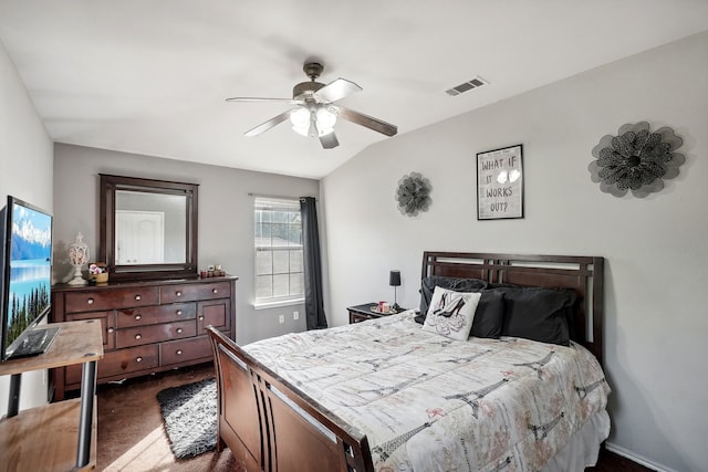 carpeted bedroom featuring lofted ceiling and ceiling fan