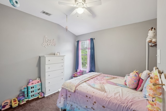 carpeted bedroom featuring lofted ceiling and ceiling fan