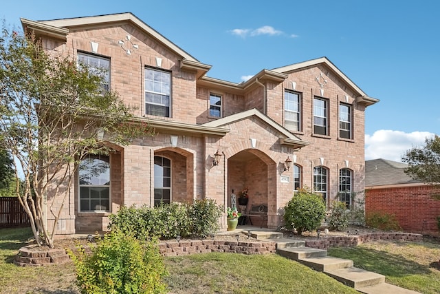 view of front of home featuring a front lawn