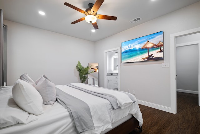 bedroom featuring dark hardwood / wood-style flooring, connected bathroom, and ceiling fan