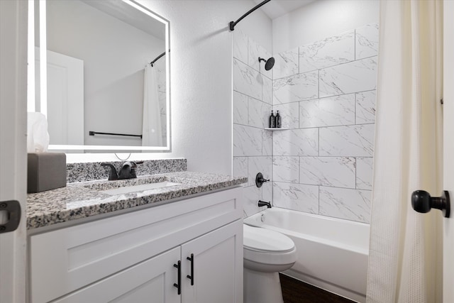 full bathroom featuring vanity, toilet, and shower / bathtub combination with curtain