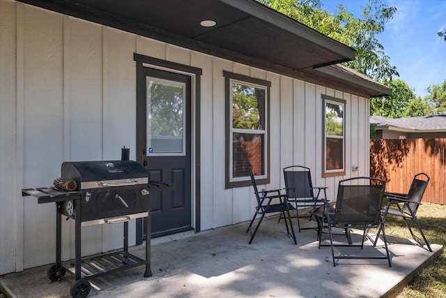 view of patio featuring a grill