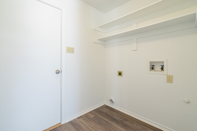 laundry room with hookup for a washing machine, a textured ceiling, hookup for an electric dryer, and dark hardwood / wood-style floors