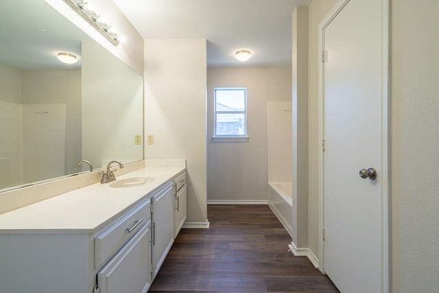 bathroom featuring vanity, shower with separate bathtub, and wood-type flooring