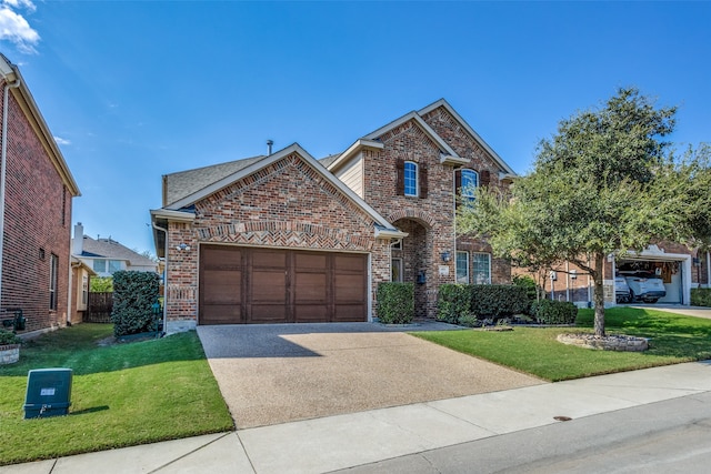 view of front property with a garage and a front lawn