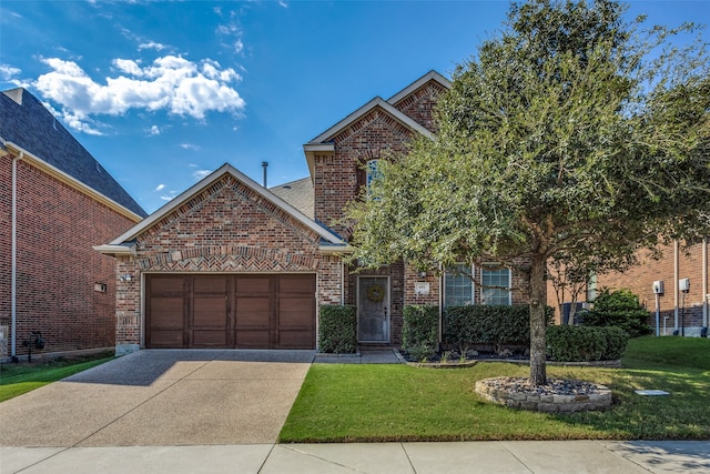 front facade featuring a front lawn and a garage