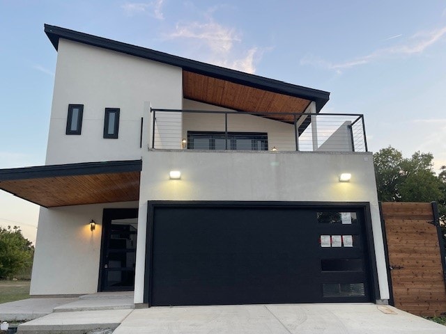 modern home featuring a garage