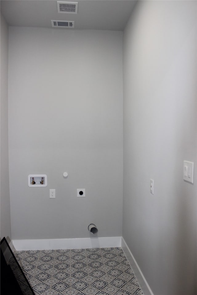 laundry room with hookup for a washing machine, electric dryer hookup, and gas dryer hookup