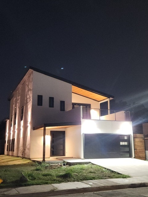 contemporary home with a balcony