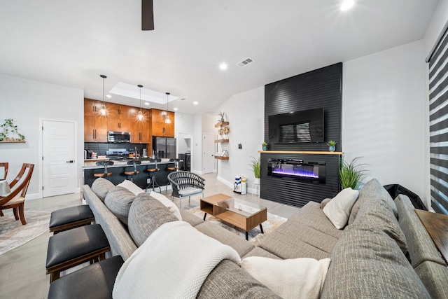 living room featuring a fireplace