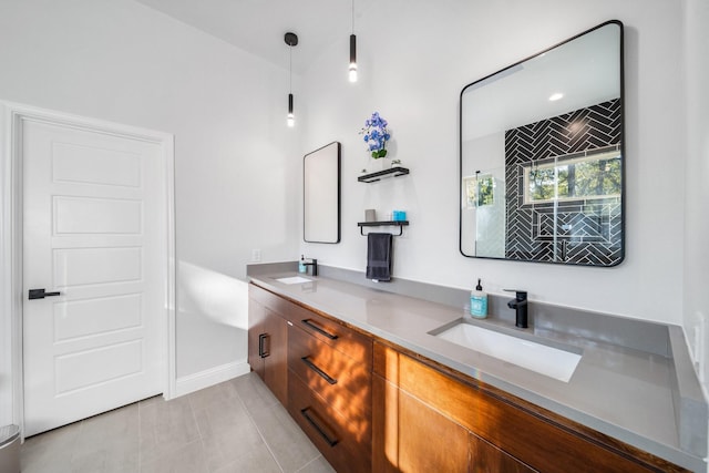 bathroom with tile patterned flooring and vanity