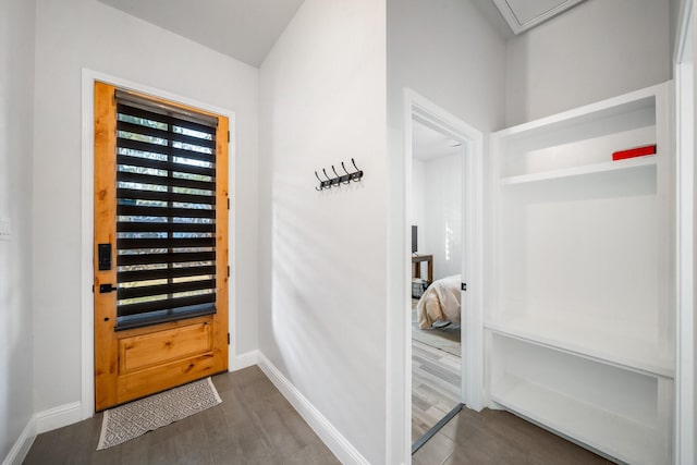 interior space with dark hardwood / wood-style floors