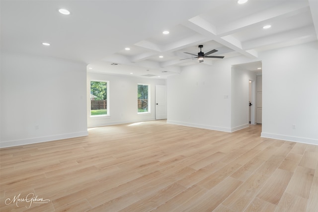 empty room with ceiling fan, beamed ceiling, light hardwood / wood-style floors, and coffered ceiling