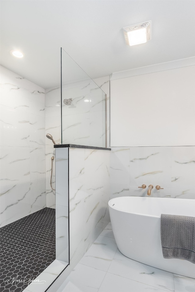 bathroom with separate shower and tub and crown molding