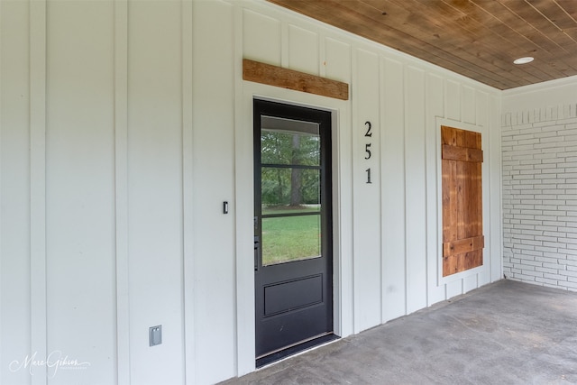 doorway to property with a porch