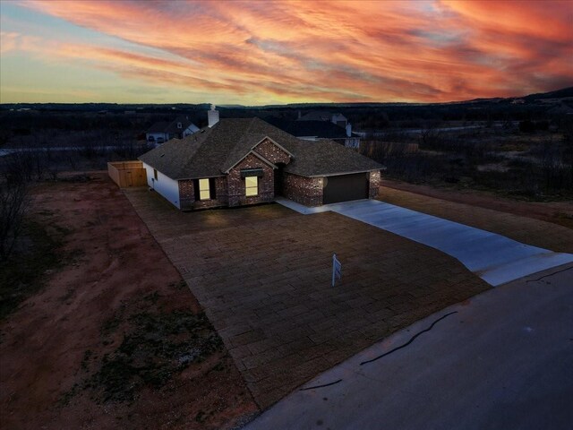 view of front of home with a garage