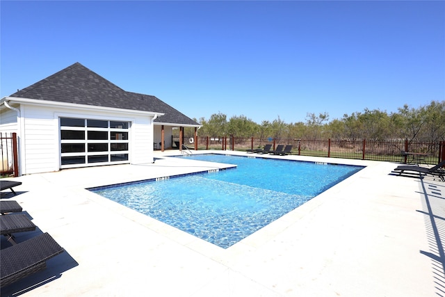 view of swimming pool featuring a patio