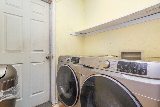 laundry area with washer and dryer