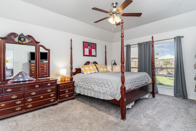 bedroom featuring lofted ceiling, light carpet, and ceiling fan