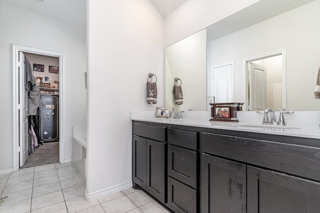 bathroom with vanity and tile patterned flooring