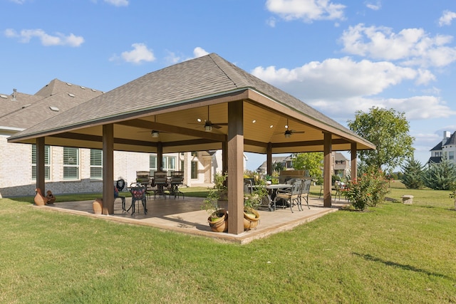 exterior space featuring a patio, a gazebo, and a lawn