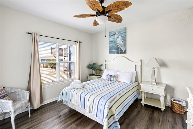 bedroom featuring dark wood-type flooring and ceiling fan