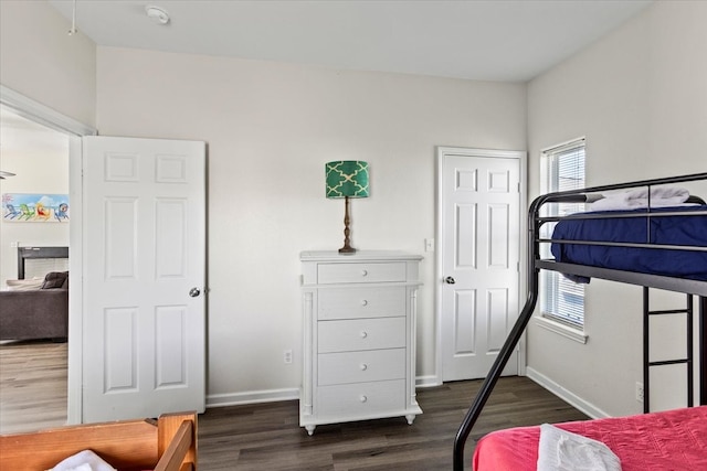 bedroom featuring dark hardwood / wood-style floors