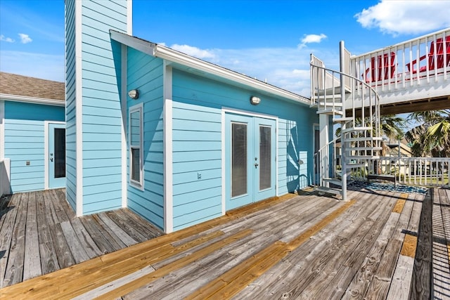 wooden deck featuring french doors