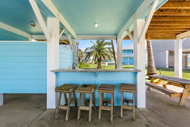 view of patio / terrace with exterior bar