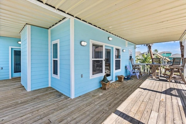 deck featuring outdoor dining area