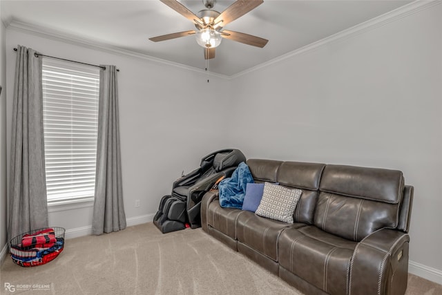 carpeted living room featuring crown molding and ceiling fan