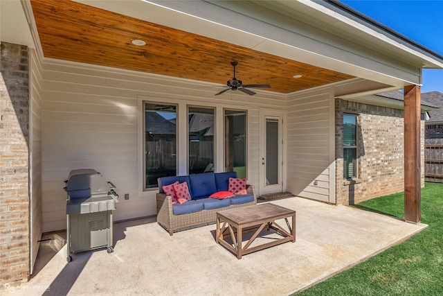 view of patio / terrace with an outdoor living space, a grill, and ceiling fan