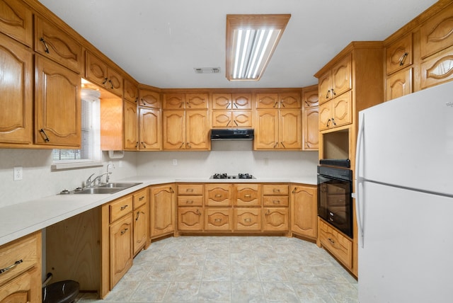 kitchen featuring black appliances and sink