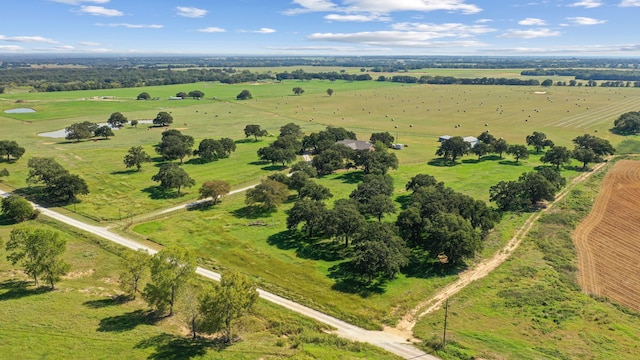 birds eye view of property featuring a rural view